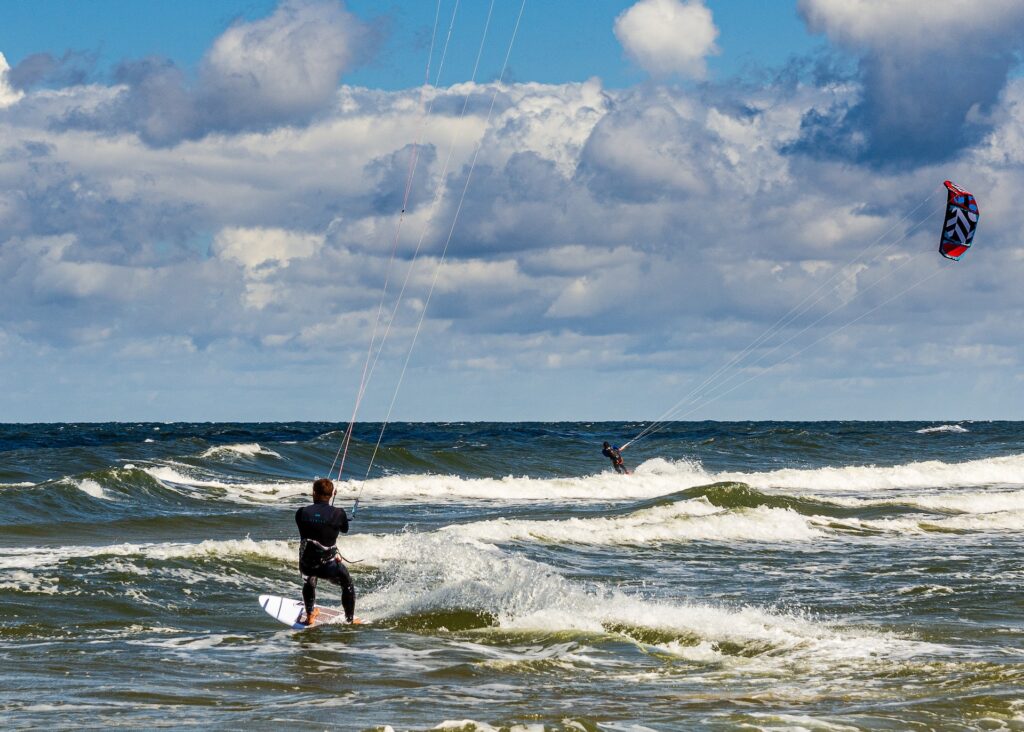 Kite surfing, also known as kiteboarding, emerged in the late 20th century, blending the creativity of windsurfing and paragliding.